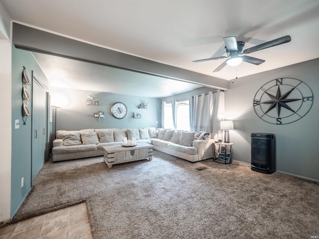11219 Denzer Rd, Evansville, IN 47712 - living room with ceiling fan and light colored carpet