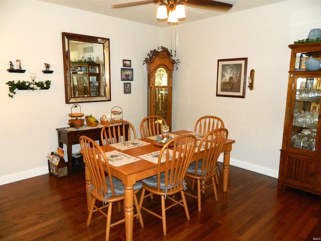 2508 N Stonelake Dr, Bloomington, IN 47404 - dining area with ceiling fan, wood finished floors, and baseboards