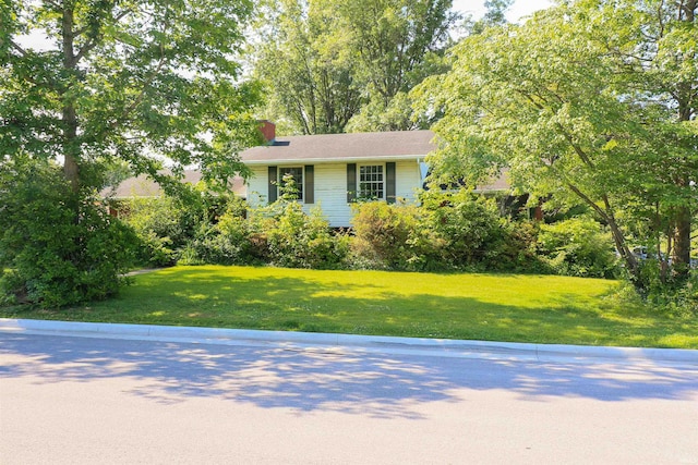 802 Hasenour Ave, Jasper, IN 47546 - view of front of house with a front lawn and a chimney
