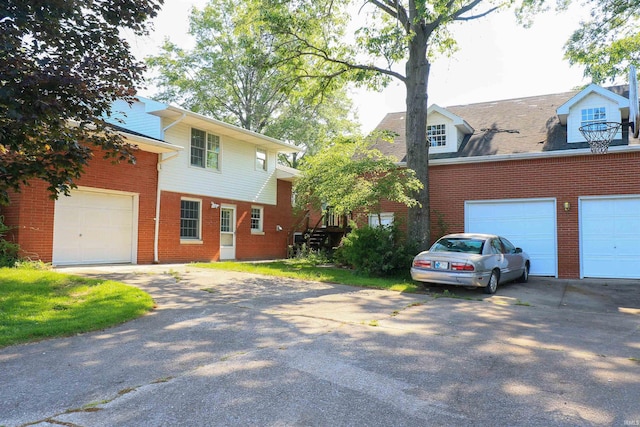 802 Hasenour Ave, Jasper, IN 47546 - view of front of home with brick siding and driveway