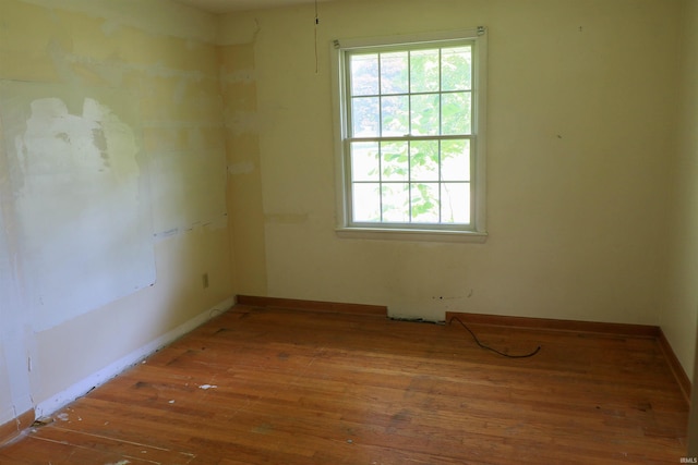 802 Hasenour Ave, Jasper, IN 47546 - unfurnished room with hardwood / wood-style floors and baseboards