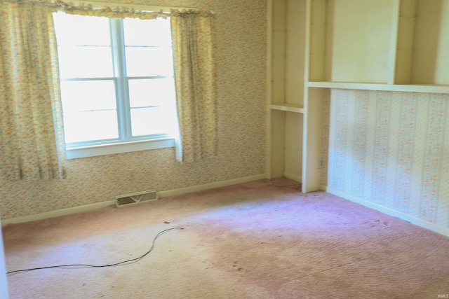802 Hasenour Ave, Jasper, IN 47546 - carpeted spare room featuring wallpapered walls