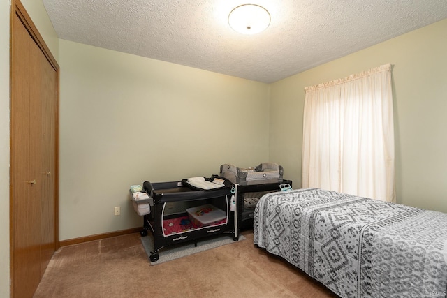 300 S Heritage Dr, Delphi, IN 46923 - bedroom with light colored carpet and a textured ceiling