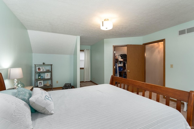 300 S Heritage Dr, Delphi, IN 46923 - bedroom featuring a textured ceiling, a closet, and baseboards