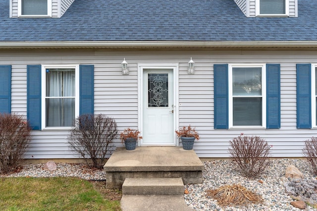 300 S Heritage Dr, Delphi, IN 46923 - view of exterior entry featuring roof with shingles