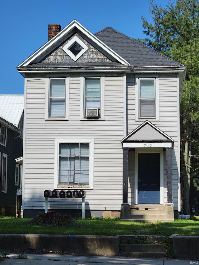 2130 Broadway, Fort Wayne, IN 46802 - view of front facade with a chimney and cooling unit