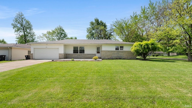 2604 Bellevue Dr, Fort Wayne, IN 46825 - ranch-style house with an attached garage, concrete driveway, a front lawn, and stone siding