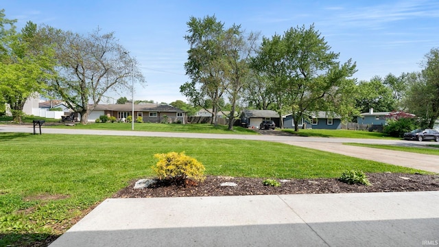 2604 Bellevue Dr, Fort Wayne, IN 46825 - view of grassy yard featuring a residential view