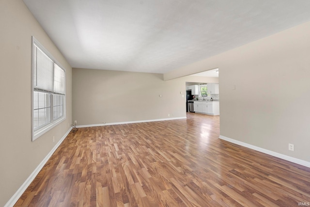 2604 Bellevue Dr, Fort Wayne, IN 46825 - spare room featuring light wood-style flooring and baseboards
