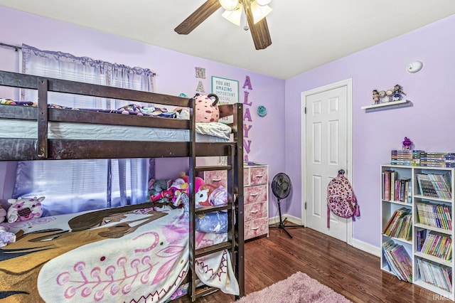 542 E Michigan St, New Carlisle, IN 46552 - bedroom featuring wood finished floors, baseboards, and ceiling fan