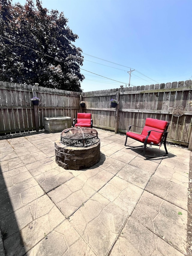503 Laura Ln, Sweetser, IN 46987 - view of patio / terrace with a fire pit