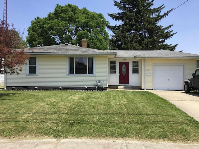 449 Cline St, Huntington, IN 46750 - ranch-style home featuring a garage, concrete driveway, a front yard, a chimney, and entry steps