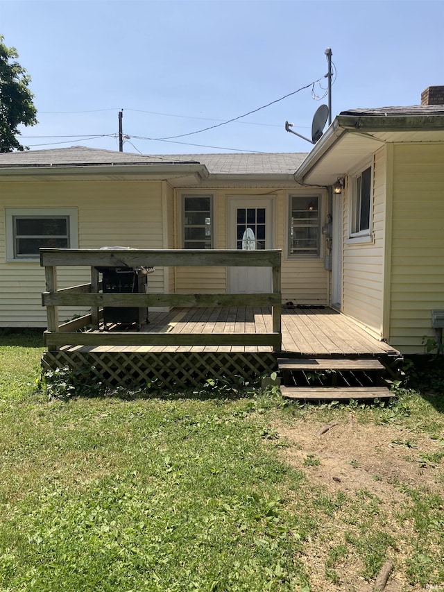 449 Cline St, Huntington, IN 46750 - rear view of house featuring a yard and a wooden deck