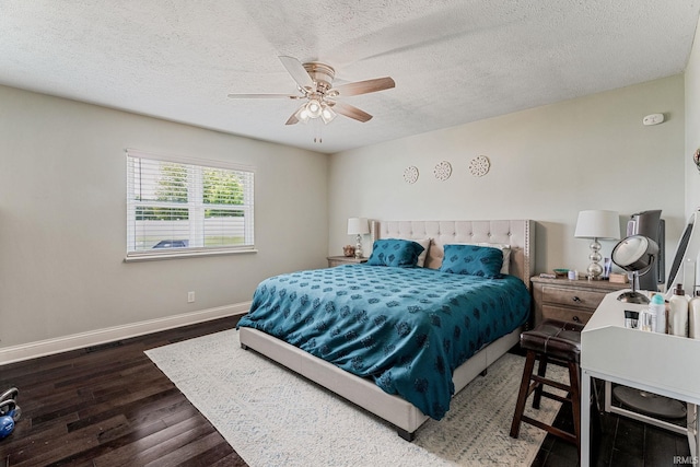 210 Meadows Dr, Greentown, IN 46936 - bedroom featuring wood finished floors, baseboards, a textured ceiling, and a ceiling fan