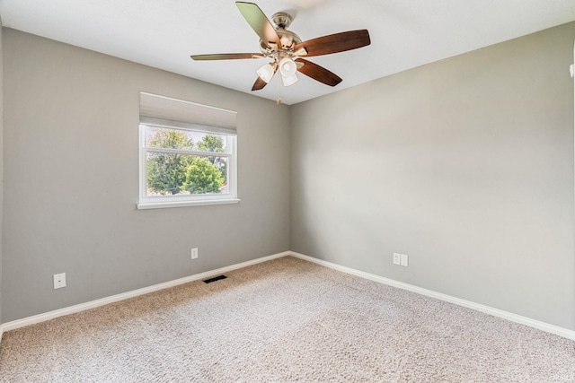 210 Meadows Dr, Greentown, IN 46936 - unfurnished room featuring carpet, a ceiling fan, and baseboards