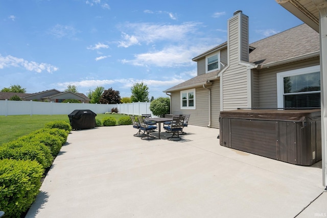 210 Meadows Dr, Greentown, IN 46936 - view of patio / terrace with a hot tub, outdoor dining space, and area for grilling