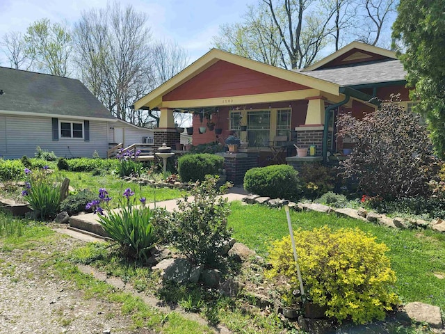 1502 S College Ave, Bloomington, IN 47403 - view of front of property featuring a porch