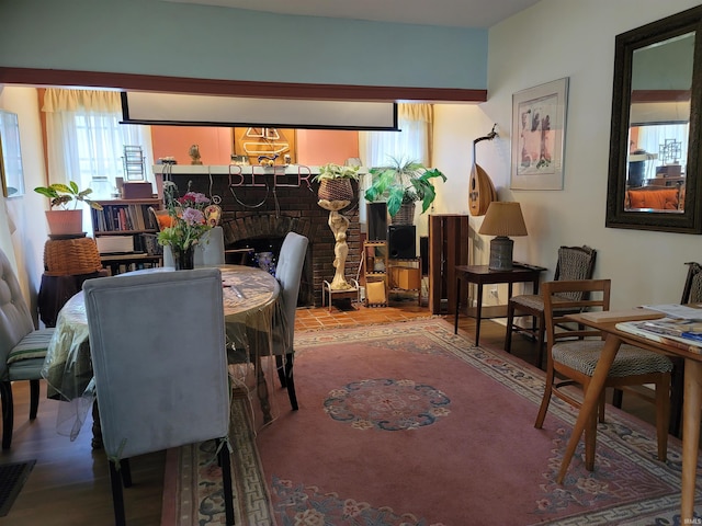 1502 S College Ave, Bloomington, IN 47403 - dining room featuring a brick fireplace