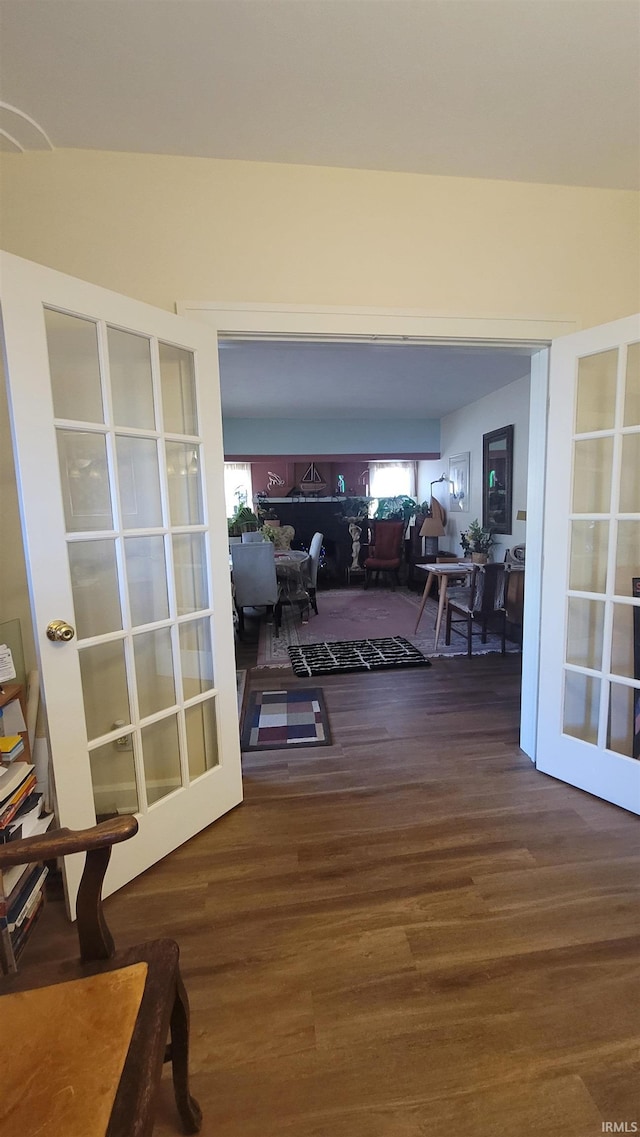 1502 S College Ave, Bloomington, IN 47403 - corridor featuring healthy amount of natural light, wood finished floors, and french doors