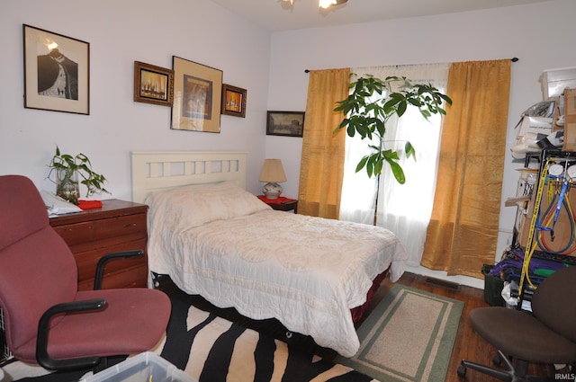 1502 S College Ave, Bloomington, IN 47403 - bedroom featuring wood finished floors