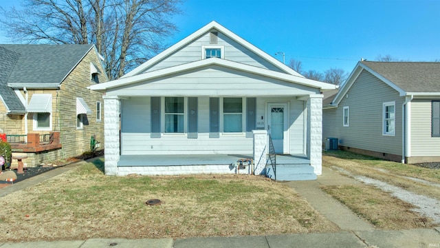 3215 Forest Ave, Evansville, IN 47712 - view of front of house with covered porch, central AC unit, and a front yard