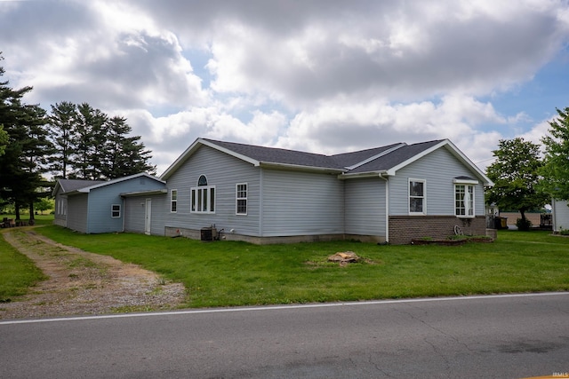 1339 Clark Ave, Bluffton, IN 46714 - view of home's exterior featuring a yard and dirt driveway