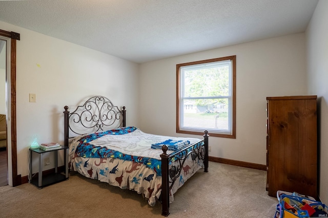 1339 Clark Ave, Bluffton, IN 46714 - bedroom with light colored carpet, baseboards, and a textured ceiling