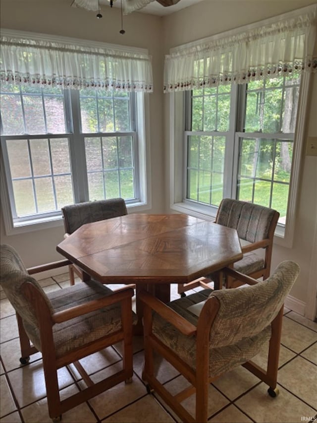 999 Inderrieden Rd, Chandler, IN 47610 - dining area featuring healthy amount of natural light, light tile patterned floors, and ceiling fan