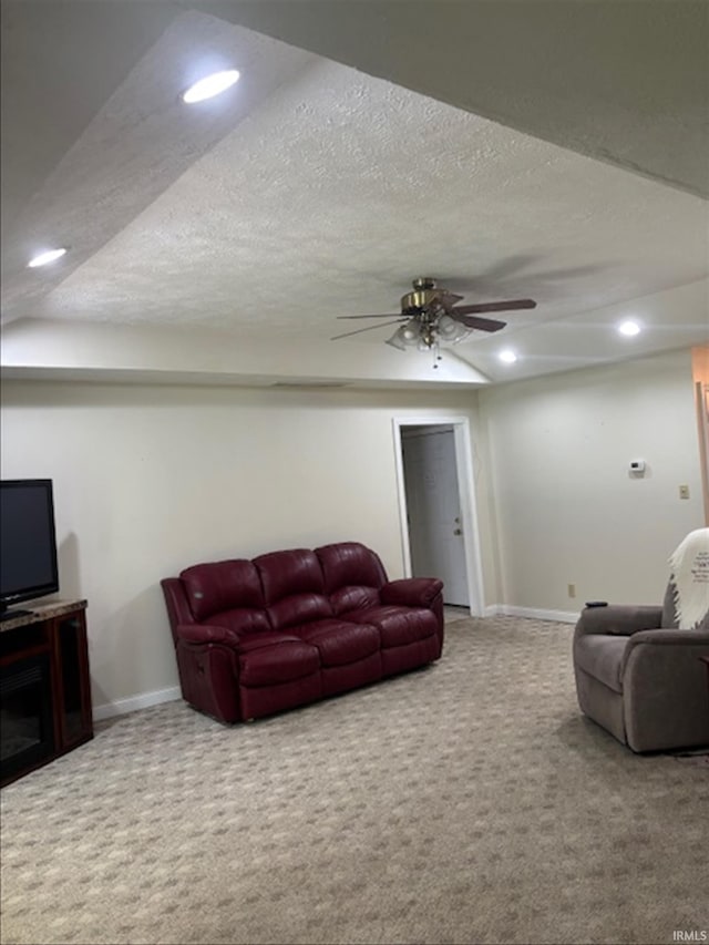 999 Inderrieden Rd, Chandler, IN 47610 - carpeted living area featuring a textured ceiling, recessed lighting, baseboards, and a ceiling fan