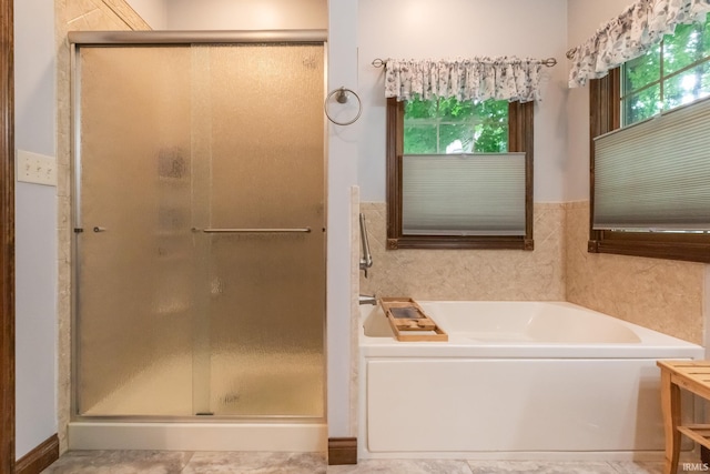 5003 N Chatham Dr, Bloomington, IN 47404 - full bathroom featuring a stall shower and a garden tub