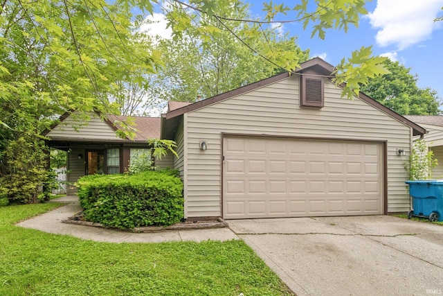 11114 E Wismar Dr, Indianapolis, IN 46235 - view of front of home with driveway, a garage, and a shingled roof