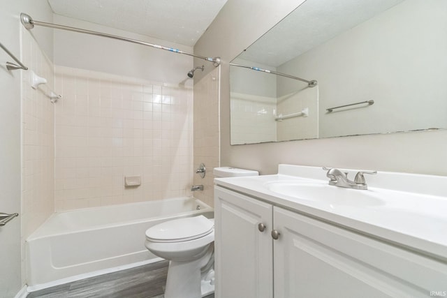 11114 E Wismar Dr, Indianapolis, IN 46235 - full bathroom with toilet, vanity, tub / shower combination, and wood finished floors