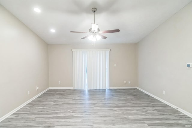 11114 E Wismar Dr, Indianapolis, IN 46235 - unfurnished room with a ceiling fan, wood finished floors, baseboards, and recessed lighting