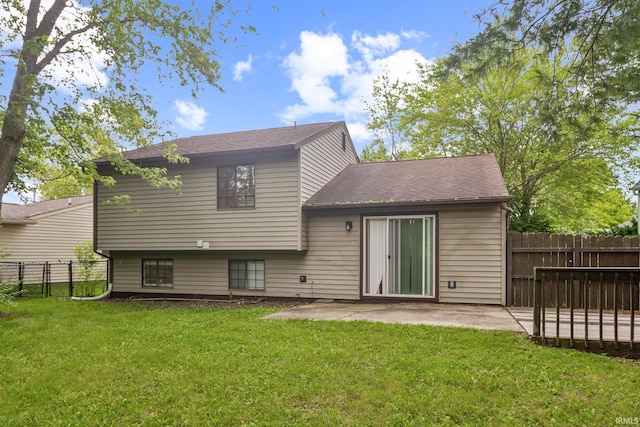 11114 E Wismar Dr, Indianapolis, IN 46235 - back of property with a patio and a shingled roof
