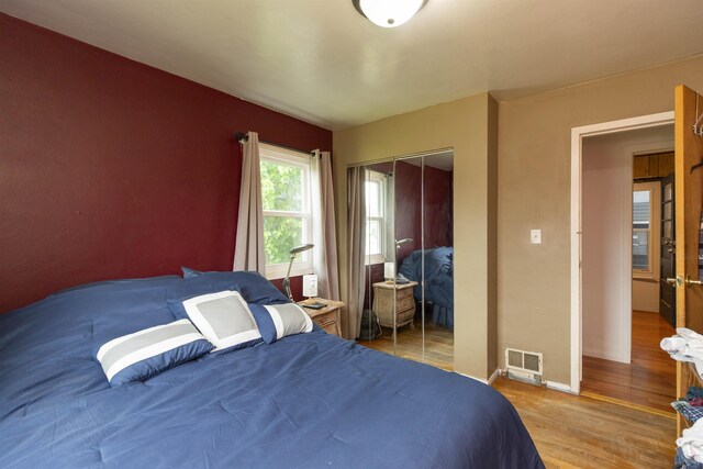 2806 Milburn Blvd, Mishawaka, IN 46544 - bedroom with wood finished floors, a closet, and baseboards