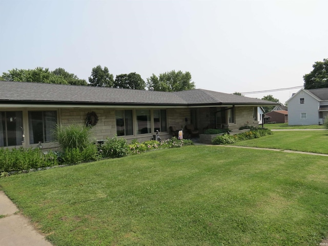 801 E Sycamore St, Petersburg, IN 47567 - ranch-style home featuring a front yard, stone siding, and roof with shingles