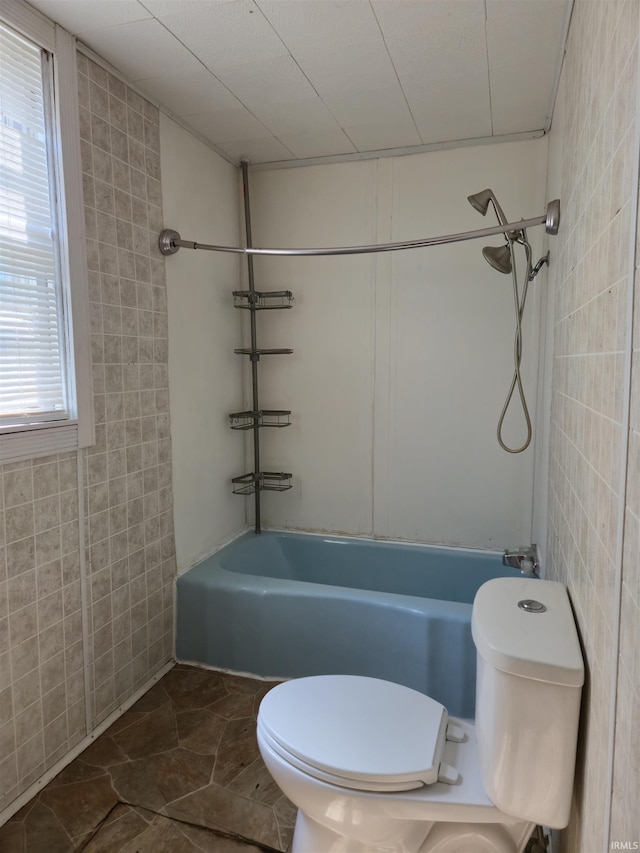 150 W Lake St, Laketon, IN 46943 - full bathroom with toilet, tile walls, and shower / bath combination