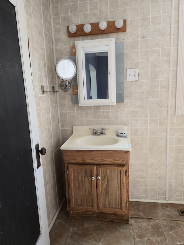 150 W Lake St, Laketon, IN 46943 - bathroom with vanity and tile walls
