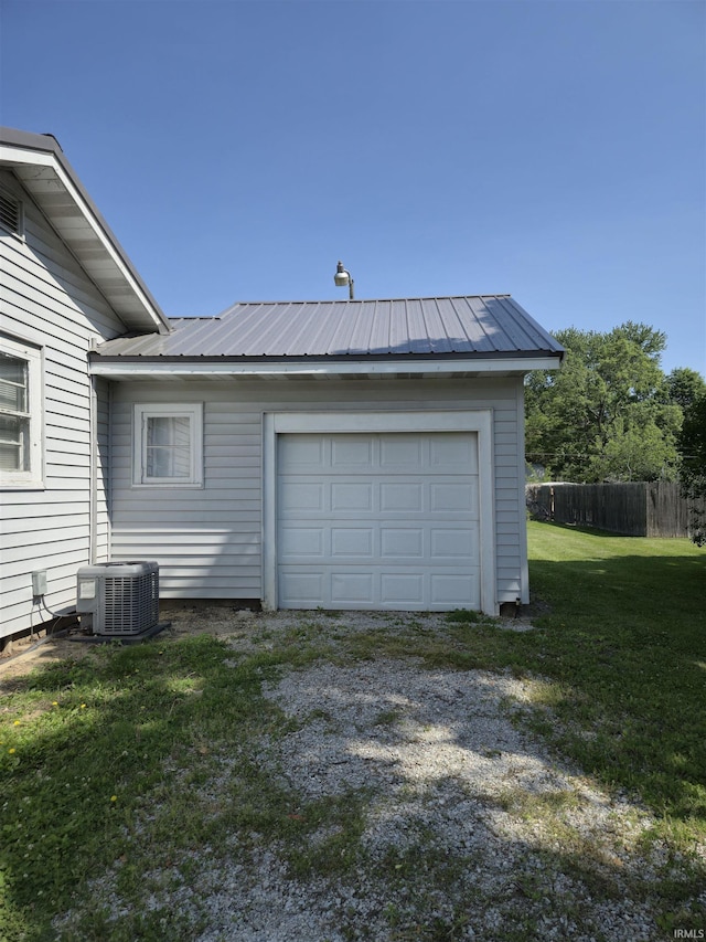 150 W Lake St, Laketon, IN 46943 - detached garage featuring central AC and driveway