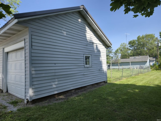 150 W Lake St, Laketon, IN 46943 - view of home's exterior featuring a garage