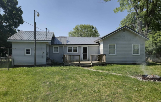 150 W Lake St, Laketon, IN 46943 - back of property featuring a wooden deck and metal roof