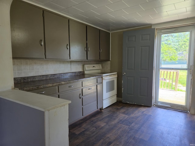 150 W Lake St, Laketon, IN 46943 - kitchen with electric stove, dark wood-type flooring, dark countertops, and backsplash