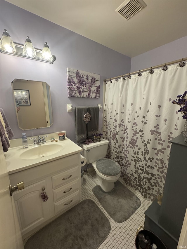 8133 Maple Ln, Newburgh, IN 47630 - bathroom with toilet, tile patterned floors, vanity, and curtained shower