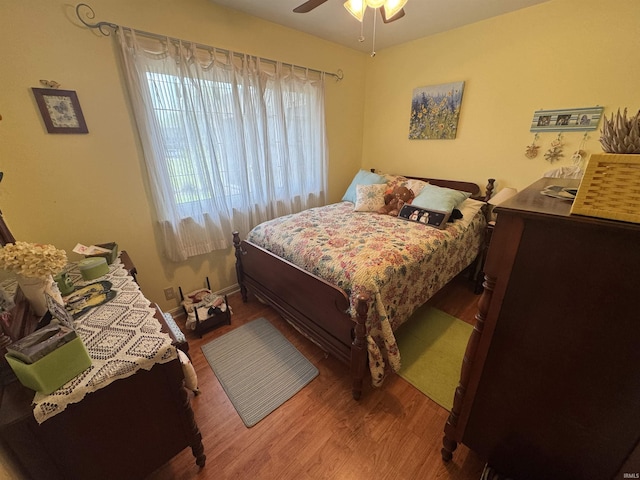 8133 Maple Ln, Newburgh, IN 47630 - bedroom with wood finished floors and ceiling fan