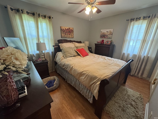 8133 Maple Ln, Newburgh, IN 47630 - bedroom with wood finished floors and ceiling fan