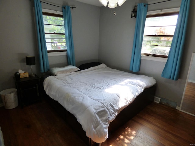 1612 N Wellington St, South Bend, IN 46628 - bedroom with wood finished floors and baseboards