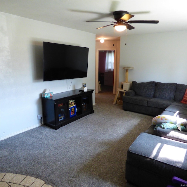 1612 N Wellington St, South Bend, IN 46628 - living room featuring ceiling fan and carpet flooring