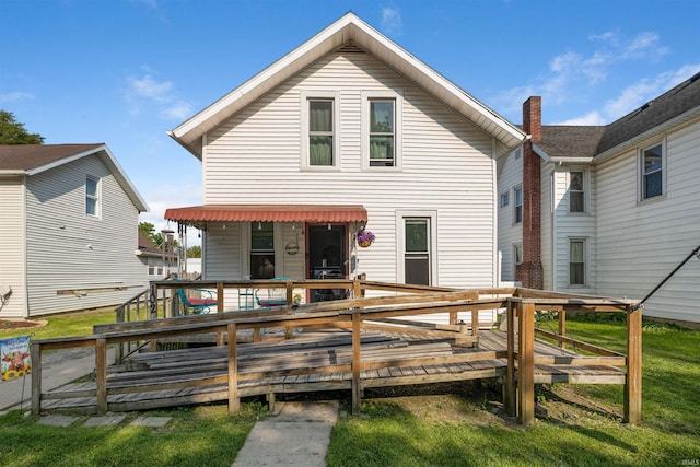 102 N Short Dr, Monroeville, IN 46773 - back of property with a deck and a chimney