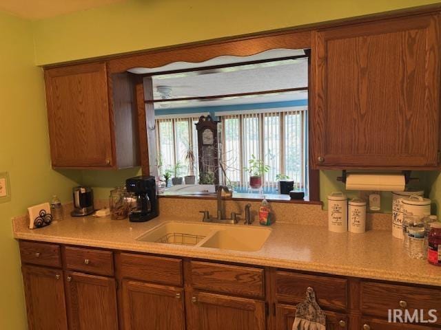 1402 E Culver Rd, Knox, IN 46534 - kitchen with a sink, light countertops, and healthy amount of natural light