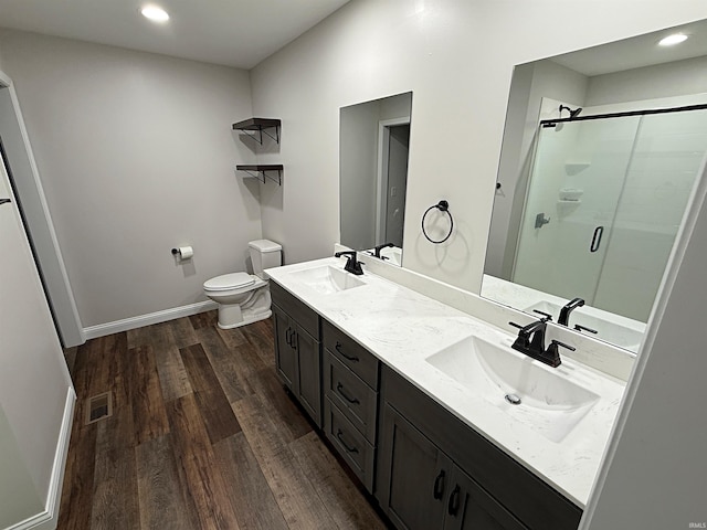 9 Deerfield Ln, Washington, IN 47501 - full bath with a stall shower, baseboards, wood finished floors, toilet, and double vanity